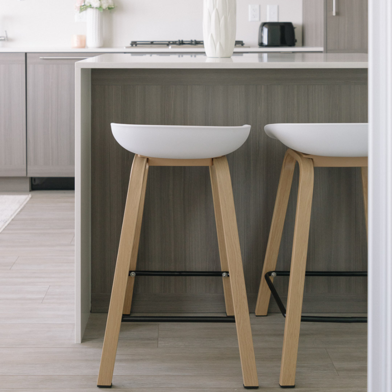 Metal Willow White Counter Stool at a kitchen counter
